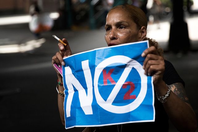 A Bed-Stuy resident protesting K2 usage in her neighborhood on Thursday